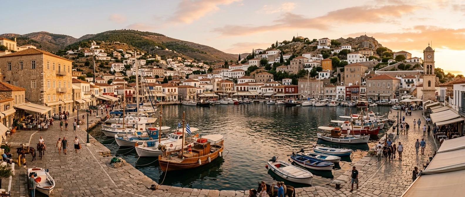Το λιμάνι της Ύδρας με πέτρινα αρχοντικά που κατεβαίνουν ως τη θάλασσα